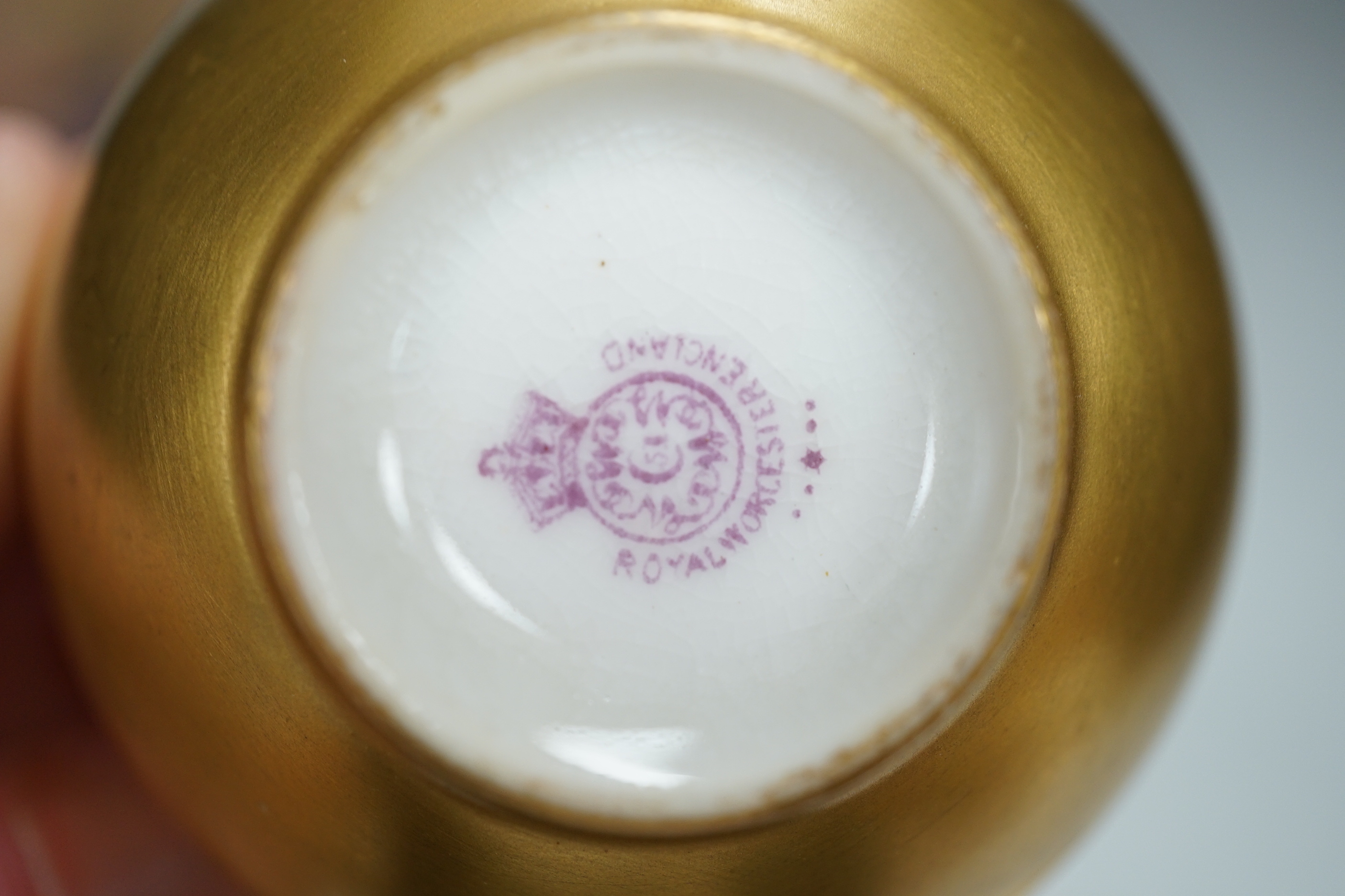A large fruit painted dish by R. Budd and a Royal Worcester fruit painted miniature tea cup and saucer painted by F Harper and W H Austin, largest 32cm in diameter